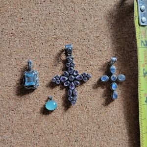 Geniuine stone pendant set sterling silver, amethyst, opal, and aquamarine.